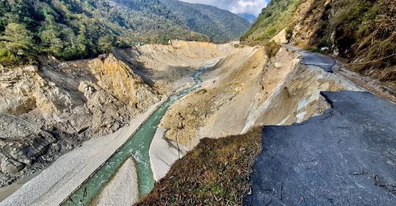 A path of devastation along the Teesta River. The flood undercut the slopes in many places, triggering landslides.