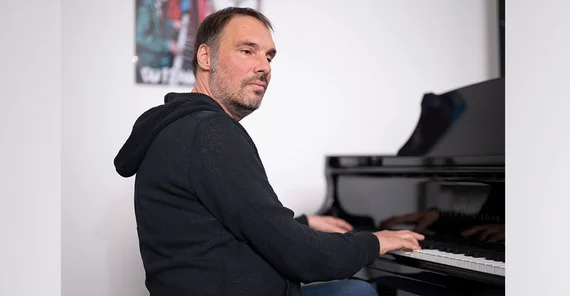 Music Professor Philip Peter at the piano