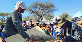 man testing grass samples