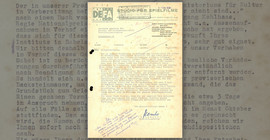 Ein vergilbtes Dokument der DEFA mit Schreibmaschinenschrift.