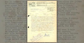 A yellowed DEFA document with typewritten text.